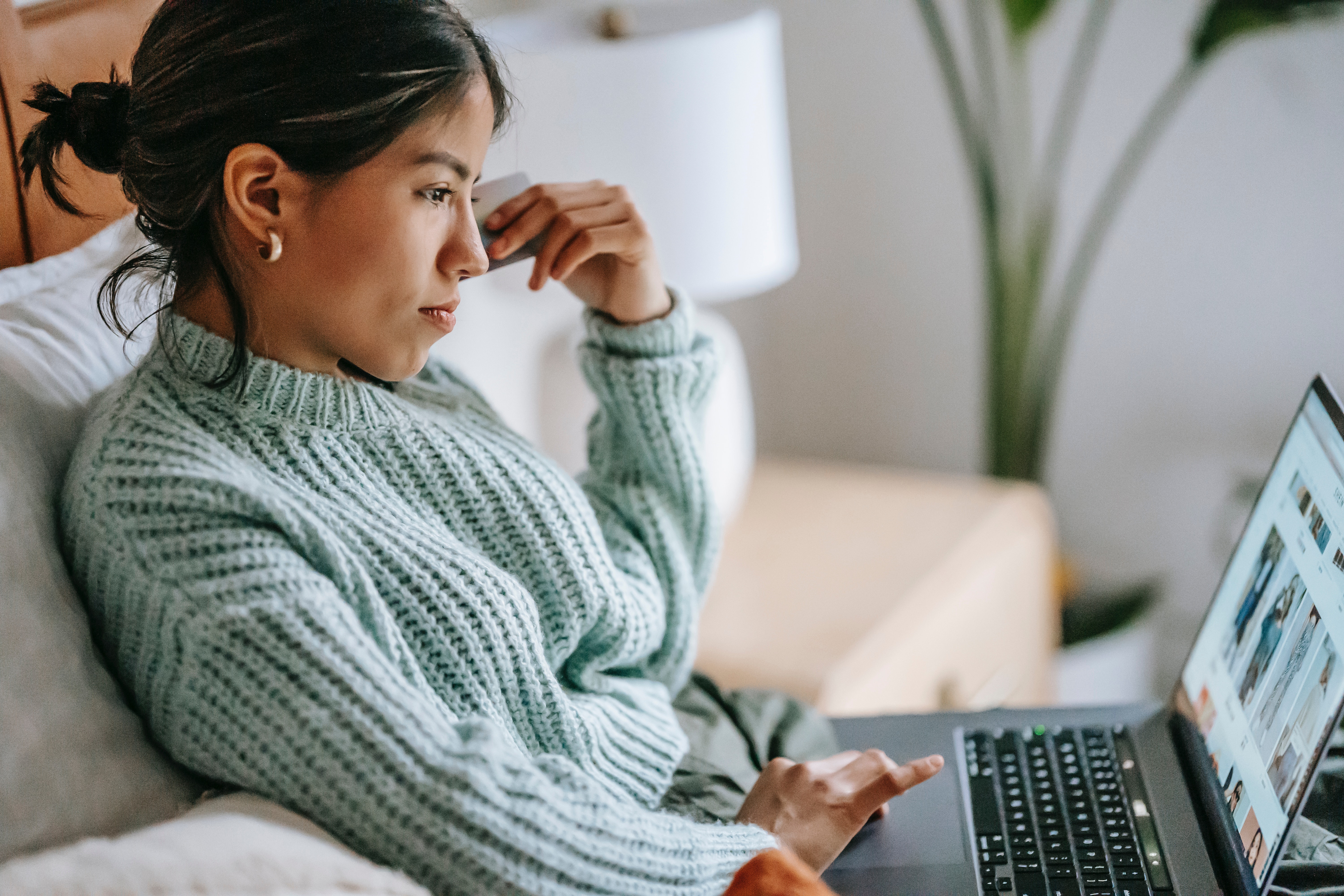 Person online shopping on a laptop